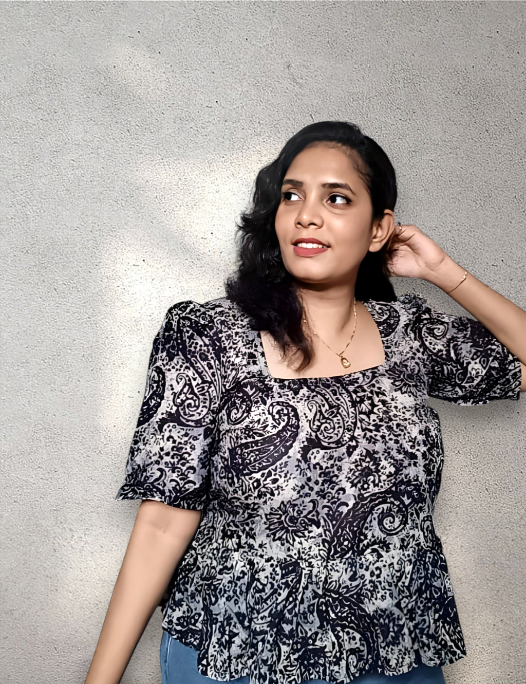 Peplum top with puff sleeves