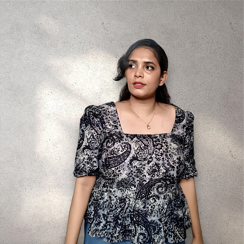 Peplum top with puff sleeves