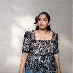 Peplum top with puff sleeves