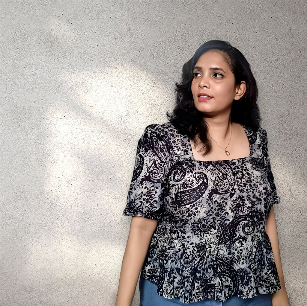 Peplum top with puff sleeves