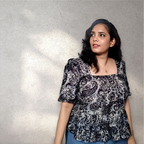 Peplum top with puff sleeves